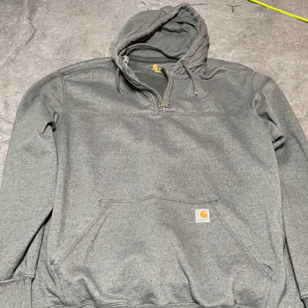 2XLT carhartt hoodie. Some bleach spots on the end sleeves(see photos).